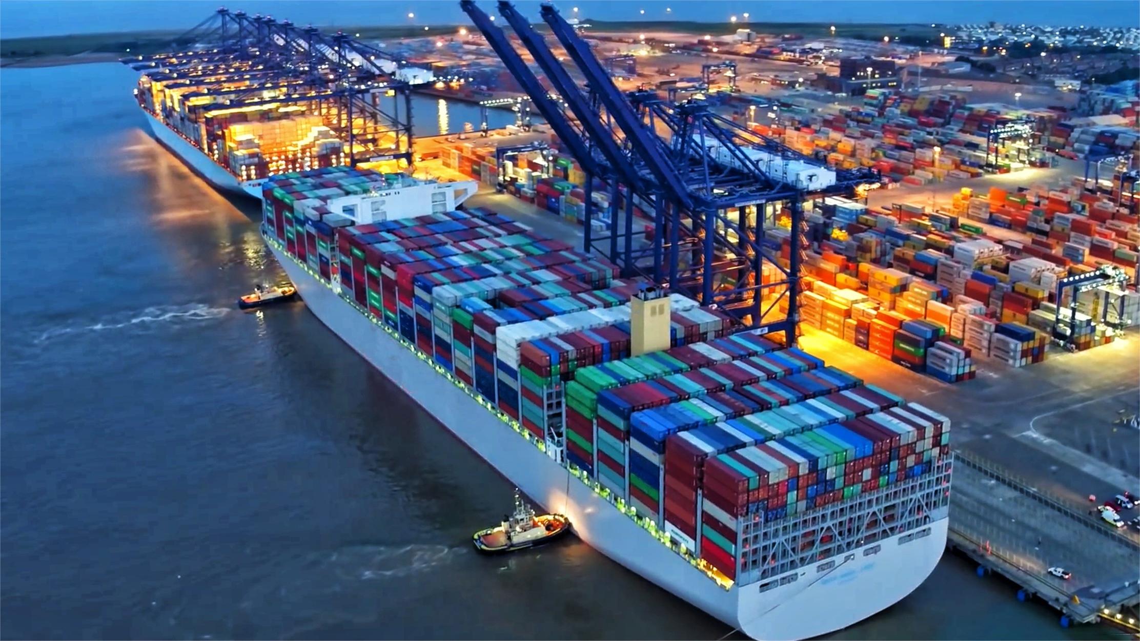 Shipping containers being loaded onto a train