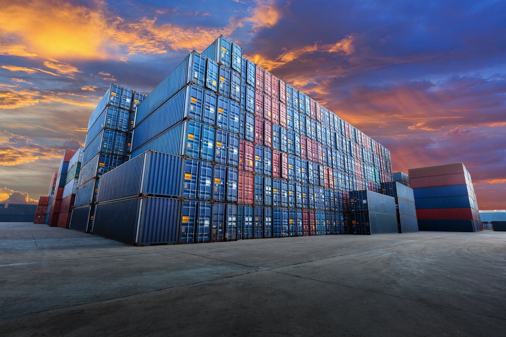 A large container ship at a busy Chinese port representing reliable logistics